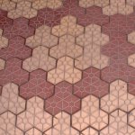 Sidewalk tiles: Red and white polygons with incised hexagons - PuDong, Shanghai