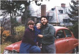 1994 Xmas photo - Carol Max and Vince  on our 1972 Saab 96 - that was a cool car